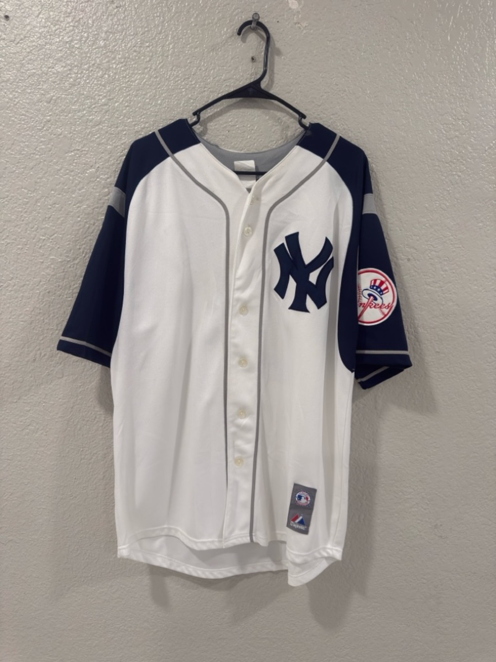 Majestic White Jersey with Gray Patch and Red & Blue Logo